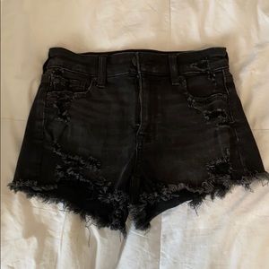 black ripped jean shorts